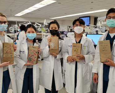 Residents holding doggy bags