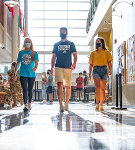 Students walking in campus building