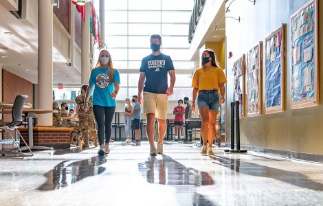 Students walking in campus building