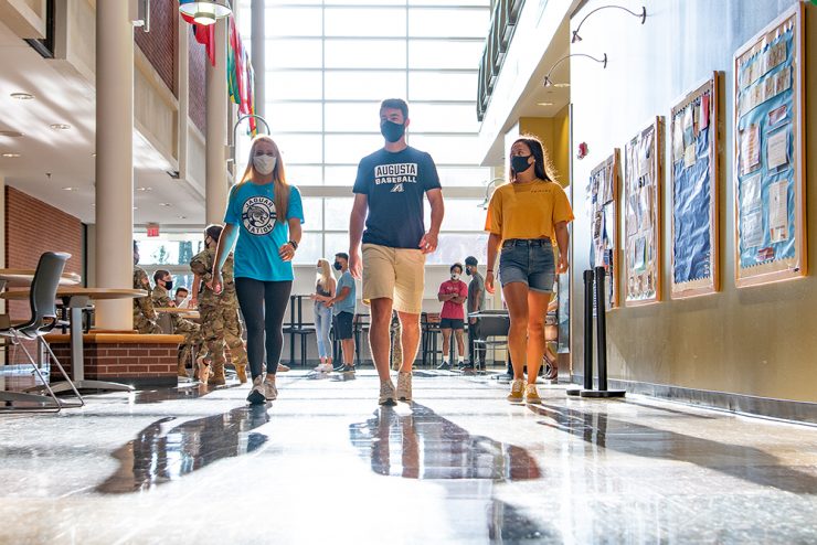 Students walking in campus building